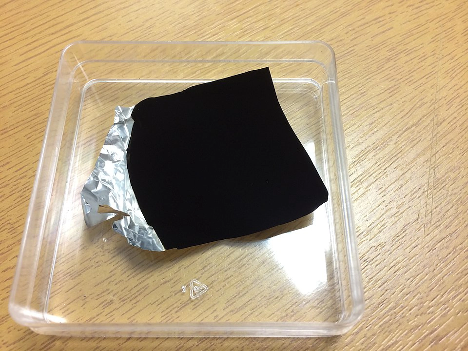 Vantablack is a synthetic substance known as one of the darkest man-made materials, capable of absorbing up to 99.965% of visible light. It is composed of vertically aligned nanotube arrays (VANTA) made of carbon