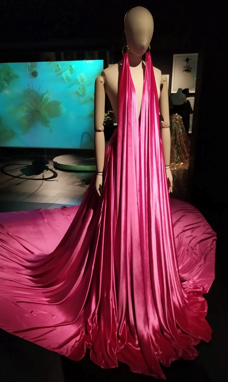 Schiaparelli Shocking Pink colors on  the Schiaparelli Haute Couture Spring-Summer 2021 collection, designed by Creative Director Daniel Roseberry.It is made of silk viscose velvet in a vibrant shade often referred to as shocking pink, a color synonymous with the fashion house founded by Elsa Schiaparelli