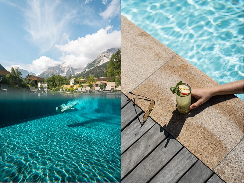 Color-corrected photo of a swimming pool with a model diving underwater. Promotional photo for a resort.