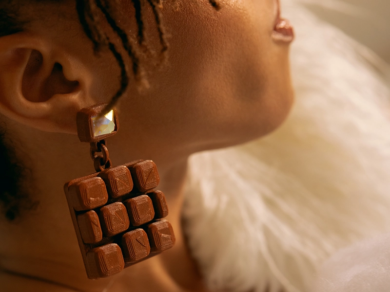 Retouched close-up portrait of a woman with Sustainable Jewelry & Accessories for fashion brand Dominique Renée