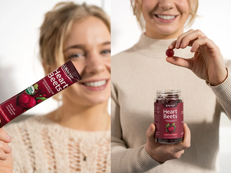 A retouched close-up photo of Snap Supplements, selective focus, in the hands of a home user. Retouched photo shoot for an advertising campaign.