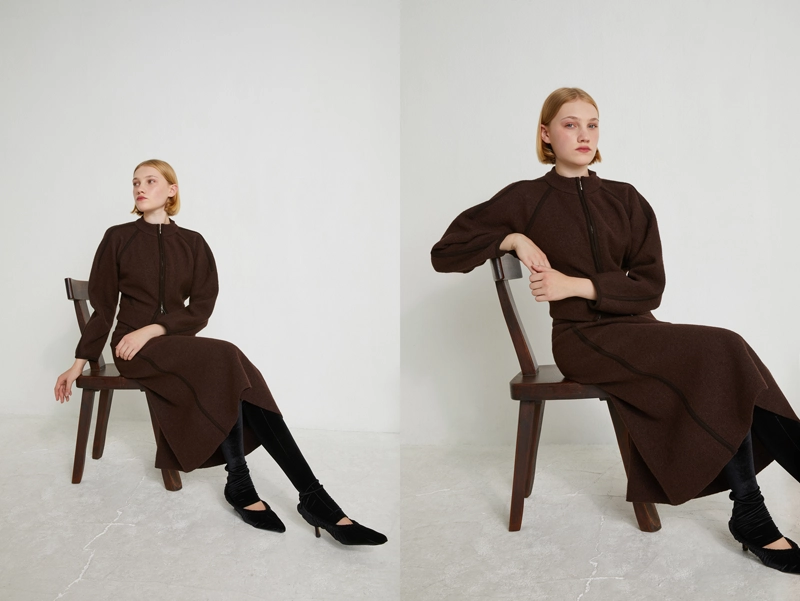 Retouching studio photos of a fashionable French brand for catalogs for Paris Fashion Week. A woman in stylish clothing sits on a chair in a studio setting.