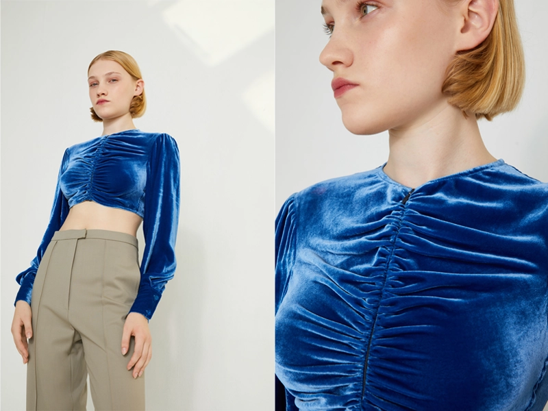 Retouched studio photos of the French fashion brand Veronique Leroy for their website for Paris Fashion Week. A photo of a model in a studio setting wearing a fashionable blue sweater and trousers, and a close-up portrait.